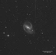 The barred spiral galaxy NGC 1097
