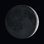 Artists’s impression of the Moon showing earthshine