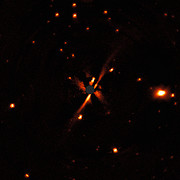 Imagens SPHERE do disco de perfil em torno da estrela GSC 07396-00759
