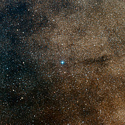 De omgeving van de jonge ster HD 163296