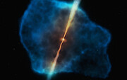 Konstnärlig bild av en avlägsen kvasar omgiven av en gashalo