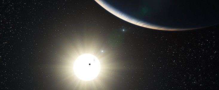 El sistema planetario alrededor del la estrella HD 10180 similar al Sol (impresión artística)