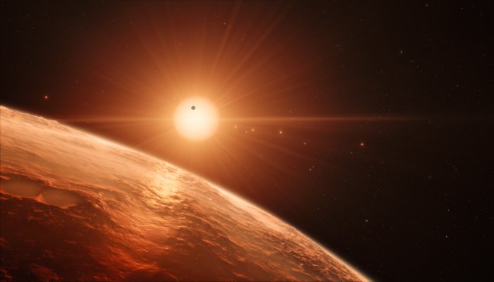 Impressão artística do sistema planetário TRAPPIST-1