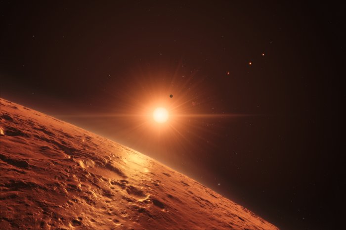 Artystyczna wizja widoku z jednej ze środkowych planet systemu TRAPPIST-1