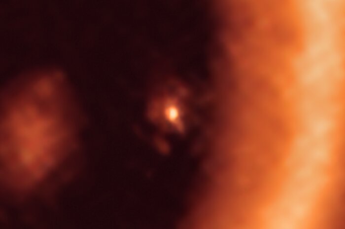 Disque à partir duquel se forme une lune autour de l'exoplanète PDS 70c, vu par ALMA