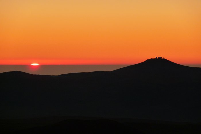 A view of Paranal at sunset from Armazones