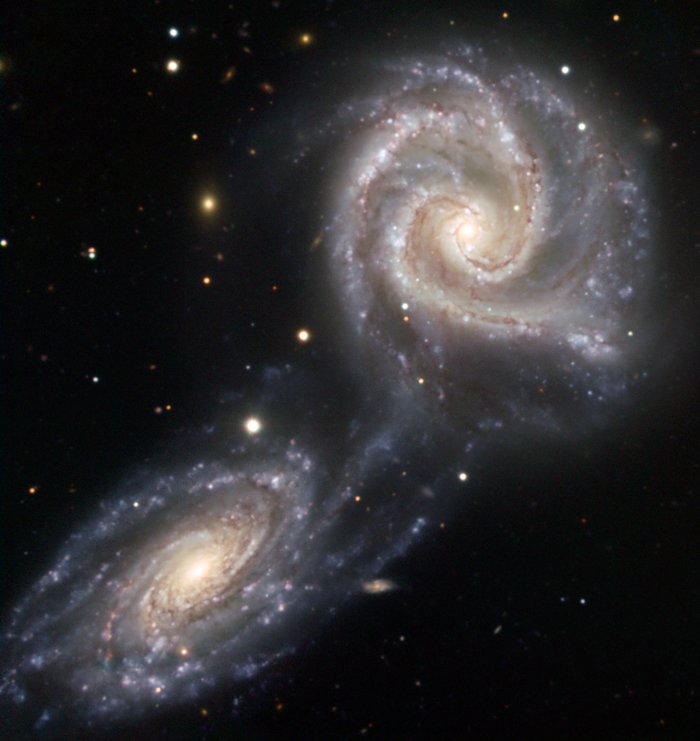Arp 271 — galaxies drawn together*