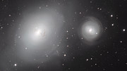Vue panoramique sur les galaxies NGC 1316 et 1317