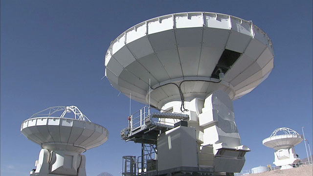 Three ALMA antennas at the OSF