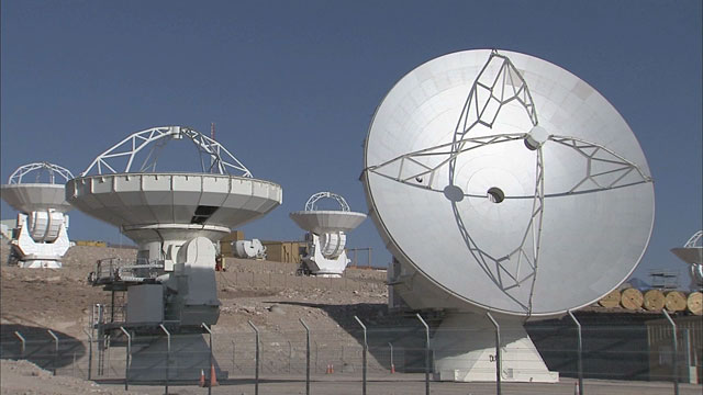 Four ALMA antennas at the OSF
