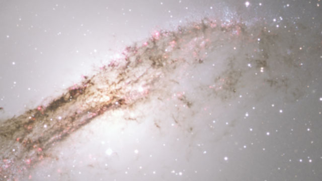 Panning over a deep view at the strange galaxy Centaurus A