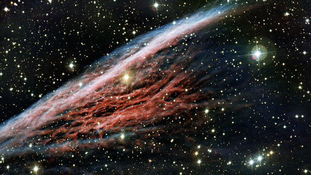 Panning across the Pencil Nebula, a strangely-shaped leftover from a vast explosion